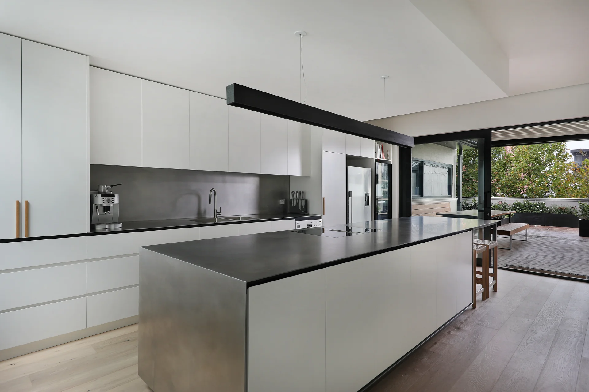 Kitchen and living with breakfast bar seating, George Street Fitzroy — Eco Building Design