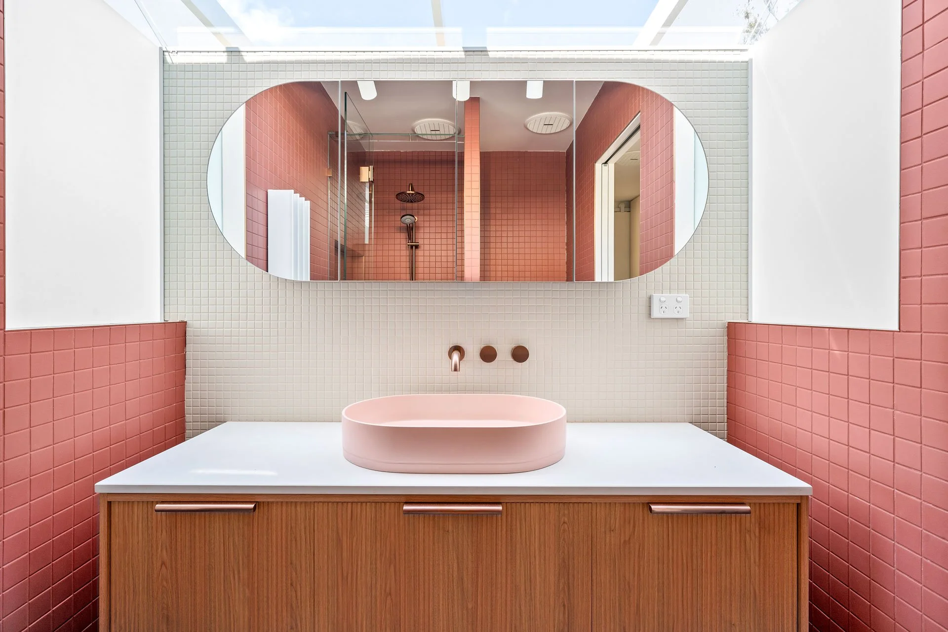 Ensuite with pink vessel basin, timber vanity and skylight, Hotham Street Beaumaris — Eco Building Design